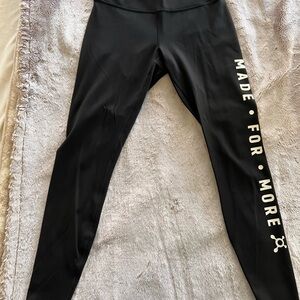 Lululemon Black Align Leggings 28” with Orange Theory White Side text